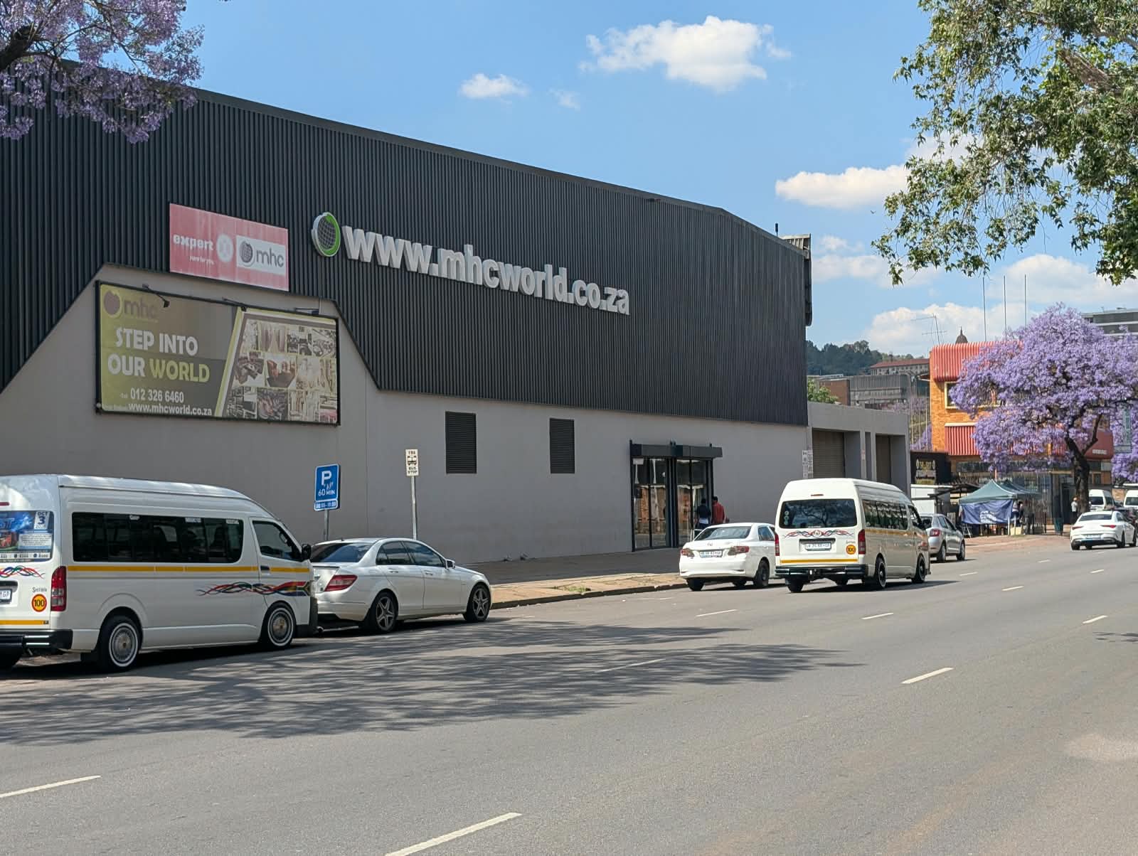 www.mhcworld.co.za building with parking area beyond